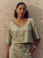 BLUSA FEMININA BOXY COM BOTAO CARACOL 
