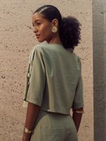 BLUSA FEMININA BOXY COM BOTAO CARACOL 