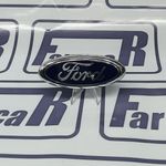 EMBLEMA TAMPA PORTA MALA TRASEIRA ORIGINAL FORD BU5A19H250AA NEW FIESTA HATCH 2014 A 2019 MONDEO 2002 A 2005