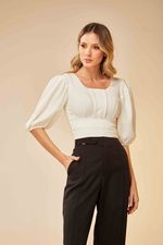 BLUSA COM PREGAS E MANGAS BUFANTES