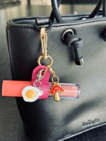 Porta Batom Charms Pink Ouro