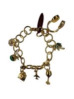 Charm e Pulseira Viagem Ouro