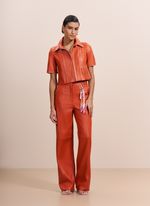 Camisa de Couro Laranja com Viés Rosa Claro
