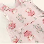 CONJUNTO INFANTIL  FLORES BODY MANGA LONGA E SALOPETE