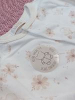 MACACÃO LONGO ESTAMPADO PASSARINHOS COM BOTÃO MAGNÉTICO