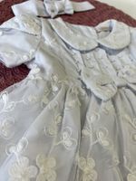 VESTIDO BEBÊ CELEBRAR KATE COM BORDADO FLORAL E TAPA-FRALDA
