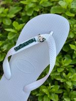 Havaianas Top Branca + Escrita Verde + Docinho Superpoderosas 