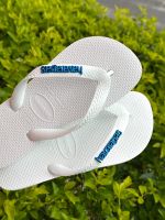 Havaianas Top Branca + Escrita Azul Metalizado 