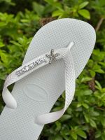 Havaianas Top Branco + Escrita Prata + Estrela do Mar