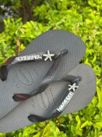 Havaianas Top Preta + Escrita Prata + Estrela do Mar