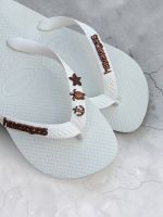 Havaianas Top Branca + Escrita Marrom + Âncora, Tartaruga e Estrela Marrom