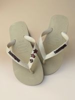Havaianas Top Areia + Escrita Marrom + Âncora, Tartaruga e Estrela Marrom