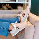 Tênis New Balance 574 Onça