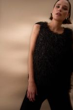 Colete Plumas