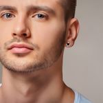BRINCO DE PRATA MASCULINO GARRA 10 MM COM 2 ONIX 6.5 MM CRAVEJADAS 21688