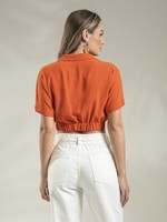 BLUSA TRANSPASSADA COM ELÁSTICO