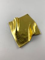 Pergaminho em Cerâmica Dourado