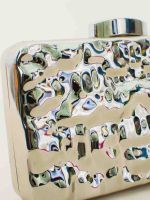 Clutch Metalizada Capri