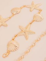 Cinto em Metal com Concha e Estrela do Mar Lari