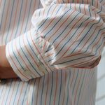 Camisa Tric Assimetrica listra azul/orange
