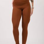 Legging Fitness Marrom Recortes Iris