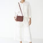 Bolsa Mini Lolla Clutch Tressê Nó | Chumbo