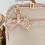 Mala de Rodinhas Linho Aveia com rose Gold Mavie