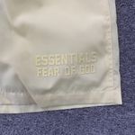 Bermuda Fear of God Essentials Nylon Running Shorts Cream