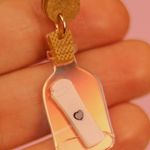 Brinco Nora Holográfico