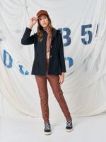 Calça em couro de poliuretano