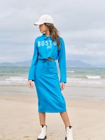 Conjunto casaco polo e saia midi