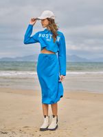 Conjunto casaco polo e saia midi