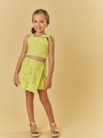 Cropped com laço e shorts saia em laise