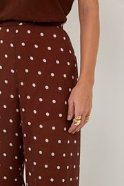 CALÇA JÉSSICA MARROM ESTAMPA POÁ