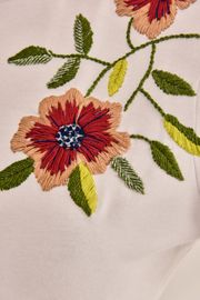 CAMISETA WHIRL COM BORDADO