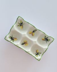 PORTA OVOS EM PORCELANA LIMÕES