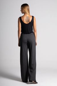 Calça de malha xadrez com pintura