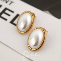 Foto do produto BRINCO PÉROLA LILA - BANHADO A OURO 18K (EDIÇÃO LIMITADA)