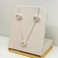 Foto do produto CONJUNTO COLAR + BRINCO MINI CORAÇÃO CRAVEJADO - BANHADO EM PRATA 925