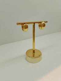 Foto do produto BRINCO MEIA ARGOLA P BANHADO EM OURO 18K