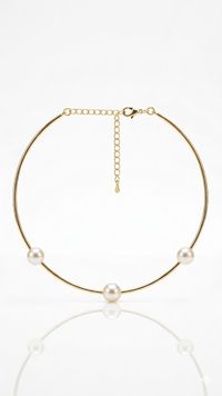 Foto do produto ARO AJUSTÁVEL COM PÉROLAS BANHADO EM OURO 18K