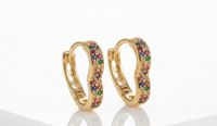 Foto do produto ARGOLA CORAÇÃO CRAVEJADO ZIRCÔNIA BANHADO EM OURO 18K