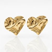 Foto do produto BRINCO CORAÇÃO ORGANICO BANHADO EM OURO 18K