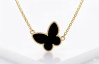 Foto do produto CHOKER REGULÁVEL BORBOLETA PRETA COM RESINA BANHADO EM OURO 18K