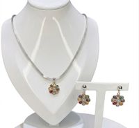 Foto do produto CONJUNTO BRINCO + COLAR FLOR COM ZIRCONIAS - BANHO EM PRATA 925