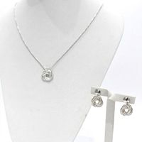 Foto do produto CONJUNTO COLAR MEDALHA ENTRELAÇADA + BRINCO BANHADO A PRATA 926