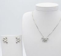 Foto do produto CONJUNTO MEIA FLOR BANHADO EM PRATA 925