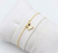Foto do produto PULSEIRA INFANTIL REGULAVEL BORBOLETAS COM ZIRCONIA BANHADA EM OURO 18K