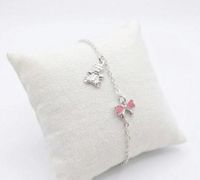 Foto do produto PULSEIRA INFANTIL REGULAVEL URSO E LAÇO ROSA COM RESINA BANHADA EM PRATA 925