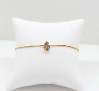 Foto do produto PULSEIRA PONTO DE LUZ GOTA BANHADO EM OURO 18K